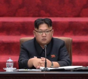 Kim Jong-un sits alone
