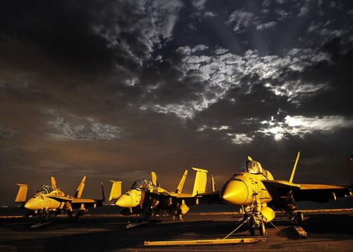 Wars and Rumors of Wars Title Photo - US Navy Jets against background of storm clouds
